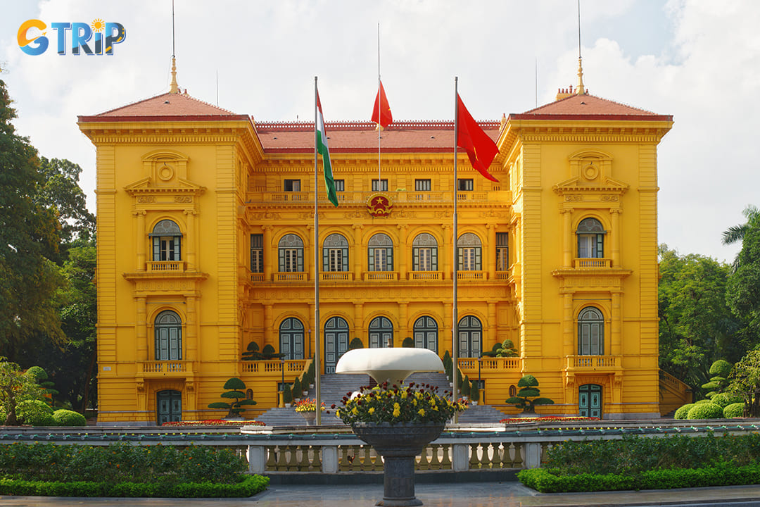 The magnificent yellow Presidential Palace stands as a striking colonial remnant, built between 1900 and 1906 as the residence of the French Governor-General of Indochina