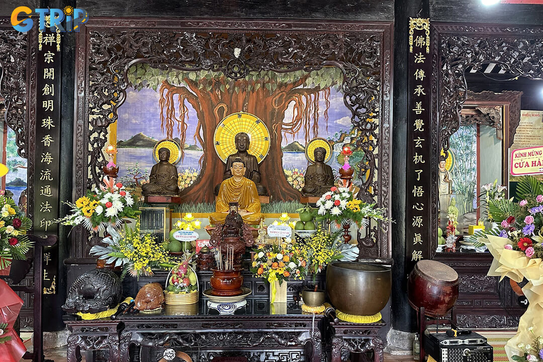 The Main Hall stands out with its grand wooden architecture, intricate carvings, and sacred statues, reflecting a rich blend of Buddhist traditions