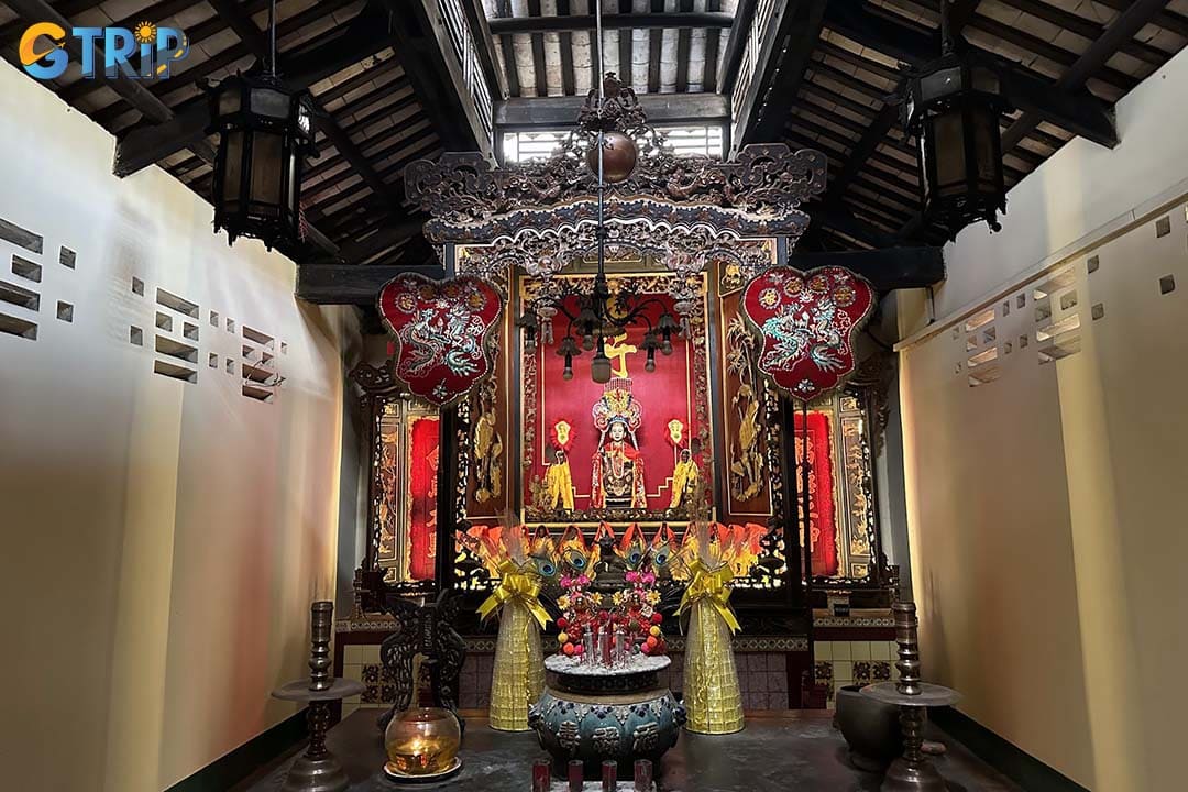 The main hall, where visitors come to pray and worship, contains three large shrines
