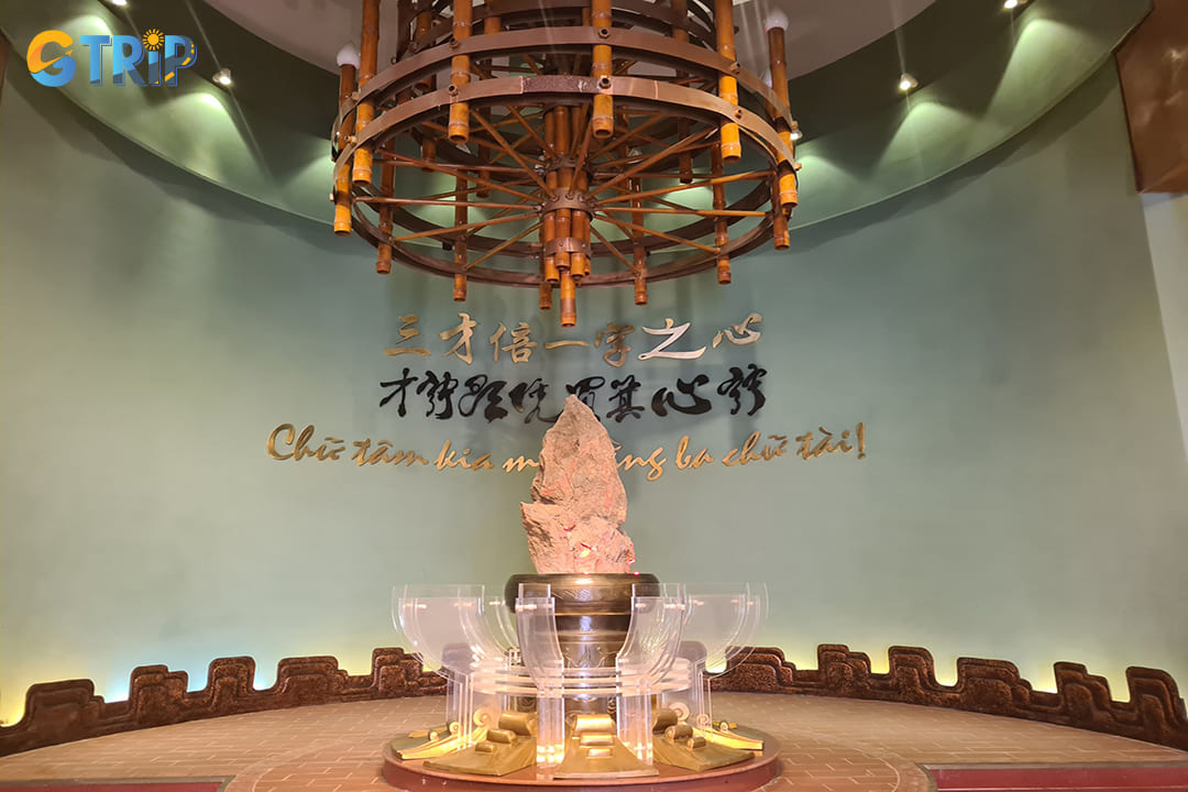 The most striking feature of the outdoor exhibition is the pen-shaped stone monument that stands as a powerful symbol of the written word