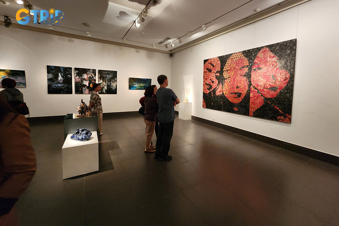 The museum’s permanent collection features over 2,000 artworks showcasing Vietnam’s artistic evolution through silk paintings, lacquerware, ceramics