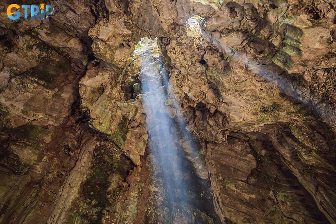 The must-see highlight of Huyen Khong Cave is the magical midday sunlight, when beams of light stream through the ceiling and illuminate the cave in a truly divine scene