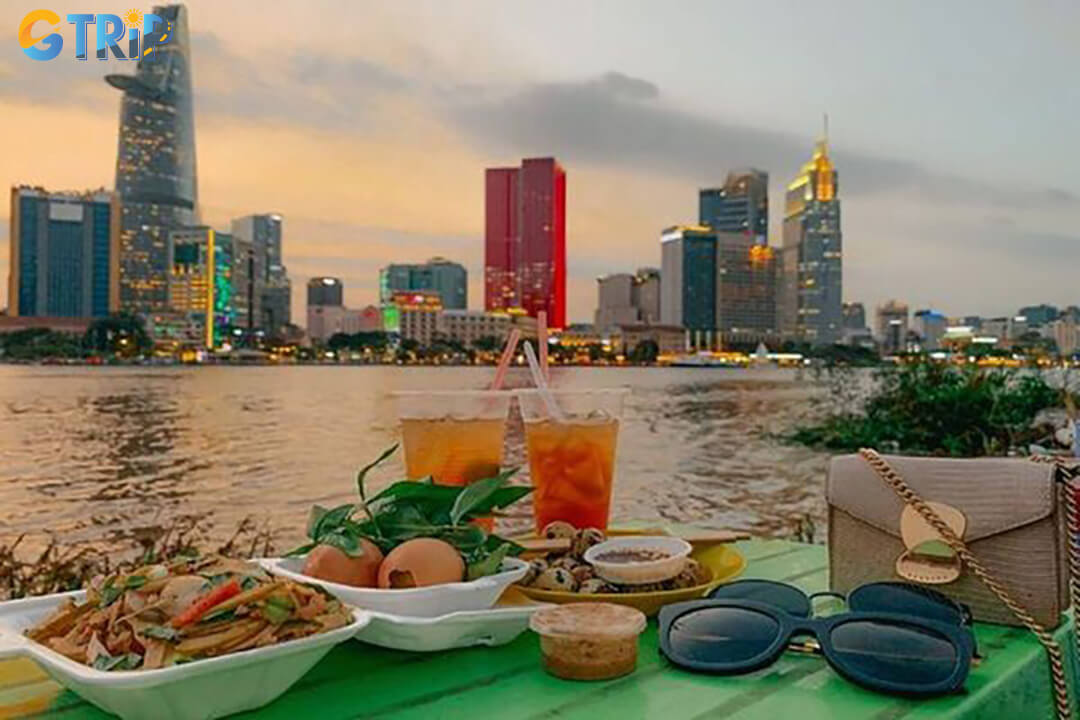 The Saigon River banks in former District 2 offer stunning city skyline views, ideal for walks, photography, and enjoying the sparkling evening lights