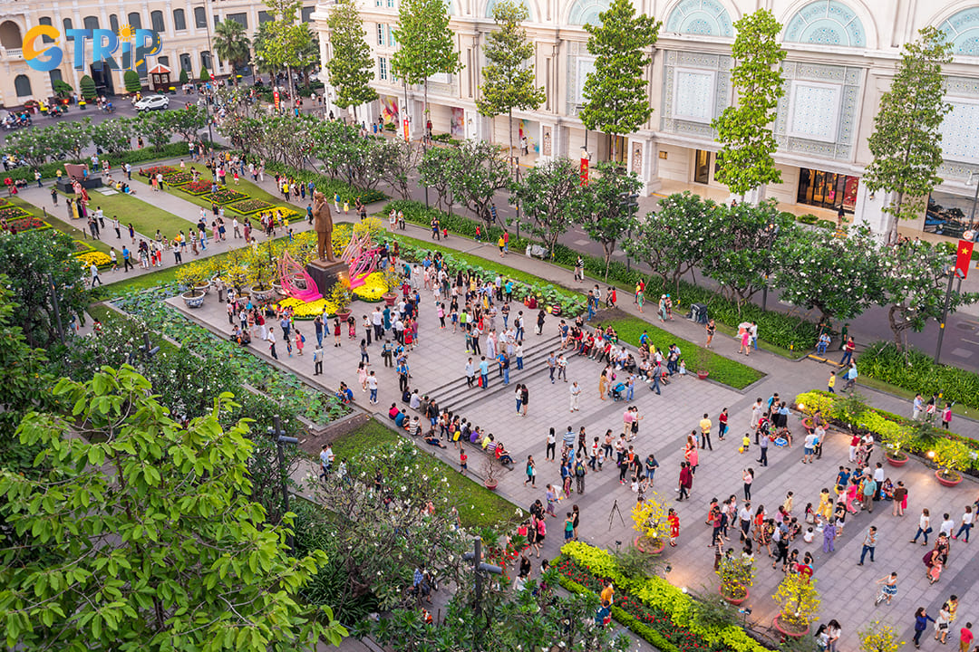 The street is primarily a pedestrian zone, with wide, smooth pavements