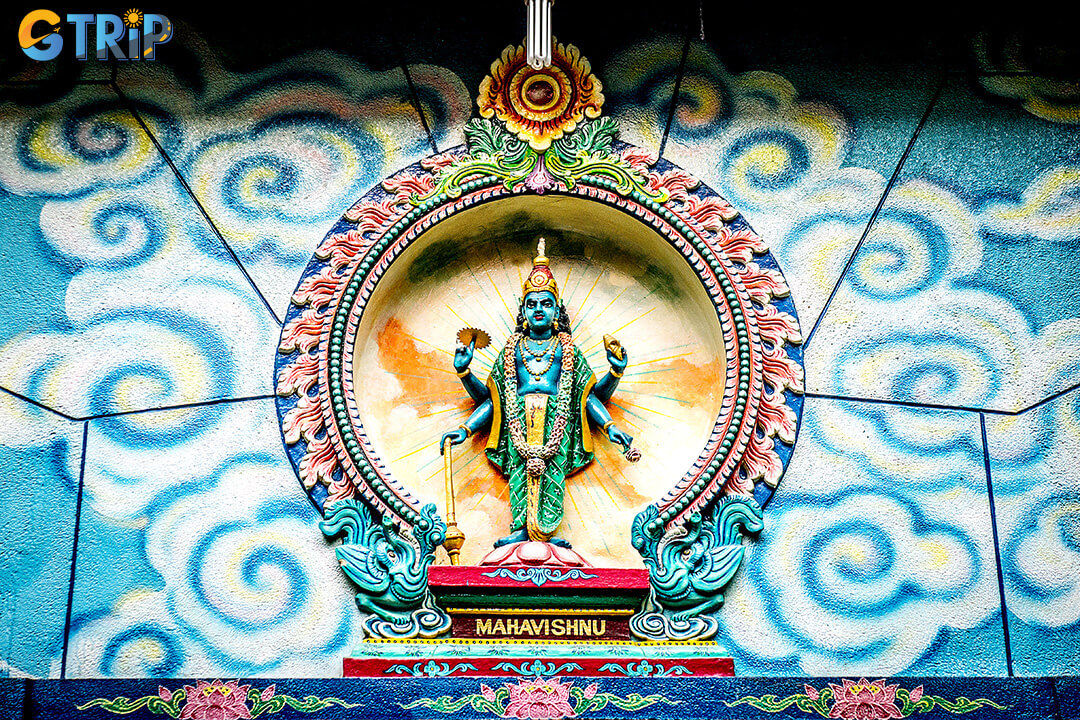 The temple’s 12-meter Gopuram, adorned with vibrant deities and sacred figures, stands as a striking symbol of South Indian architecture and a spiritual gateway to the divine