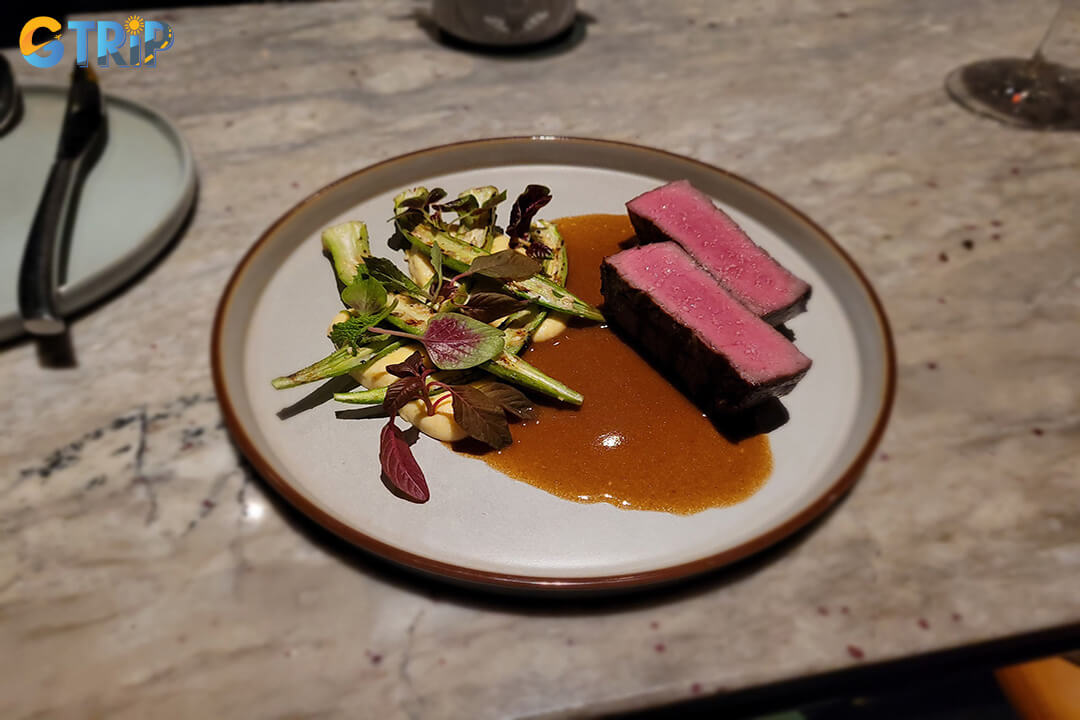 The Trieu Institute is a chic gin bar and modern dining spot, blending inventive cocktails with contemporary Asian and Western cuisine in a stylish former District 1 setting