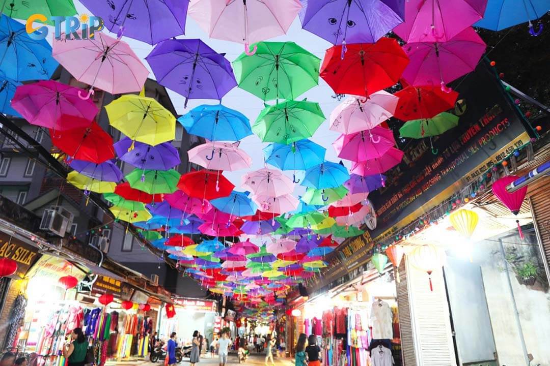 The umbrella road at Van Phuc Silk Village is a vibrant, photo-worthy walkway where colorful silk canopies showcase traditional designs