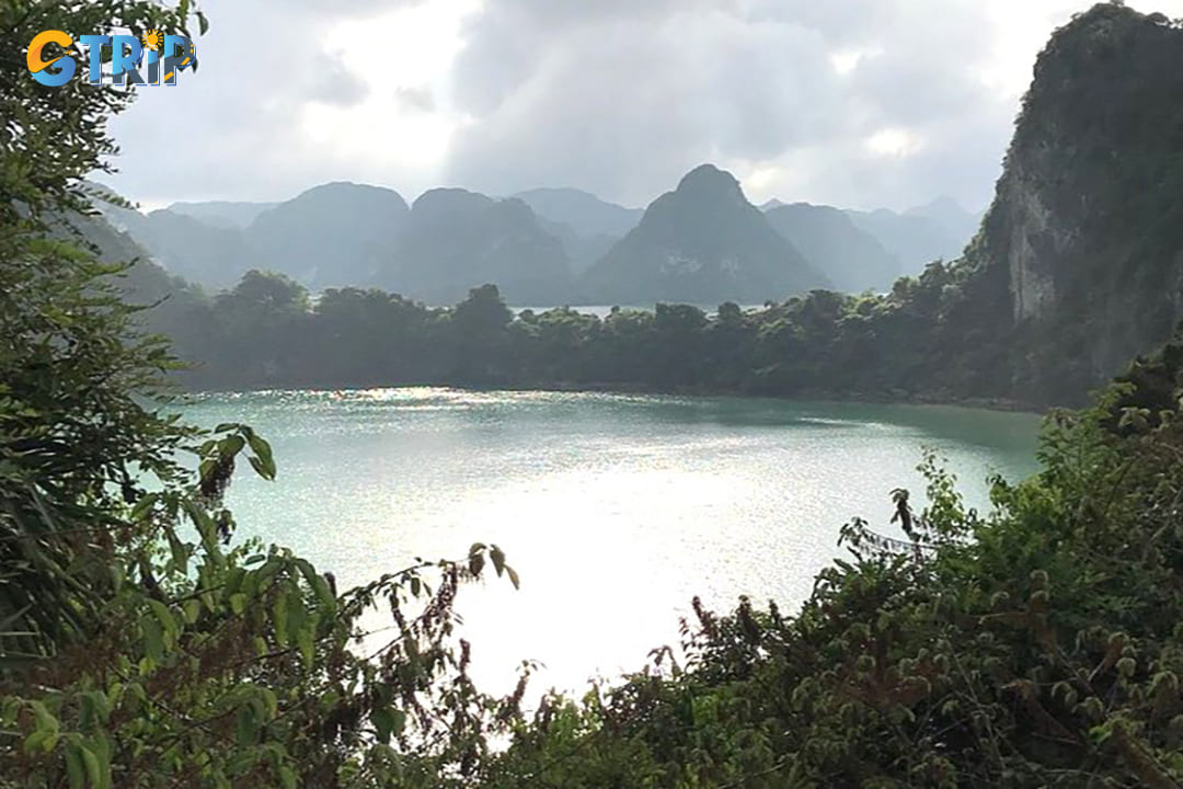 This peaceful lake surrounds the end of the cave system and features stunning natural scenery