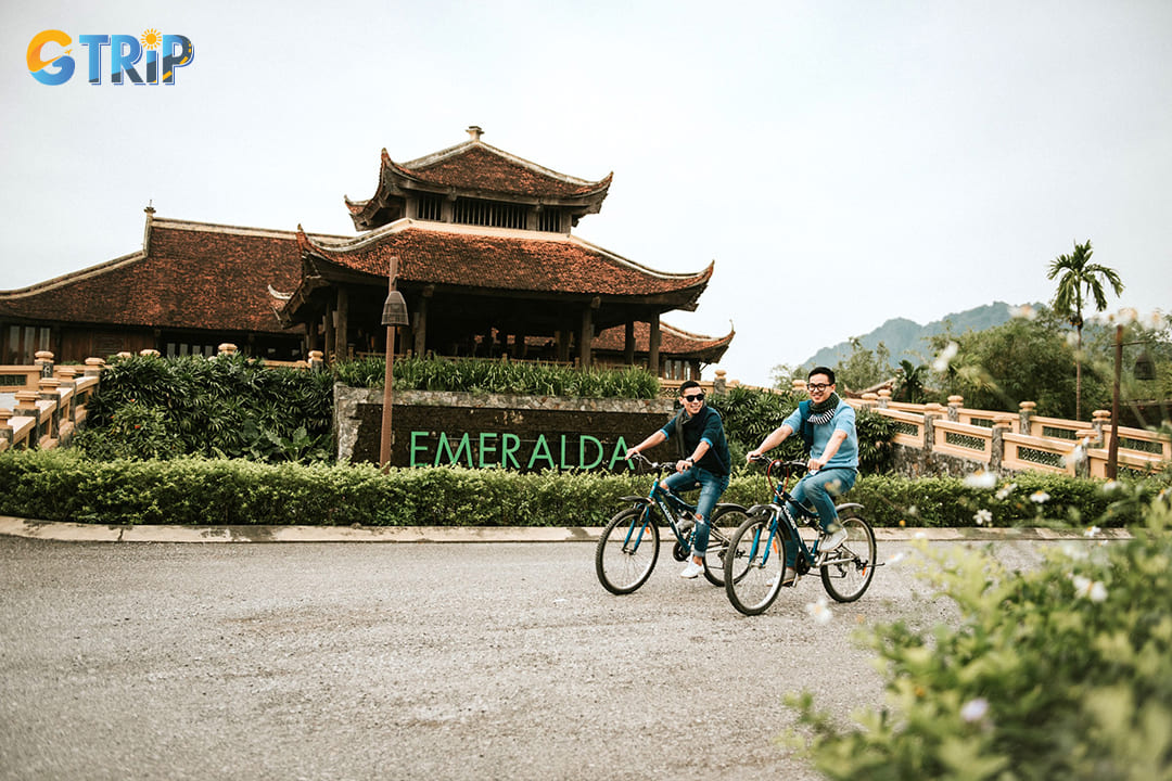 Tourists are cycling inside the resort area to enjoy the surrounding