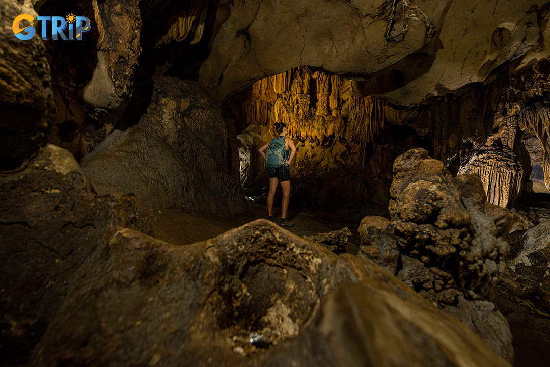 Tourists are exploring the rock formations and a diverse ecosystem in the cave