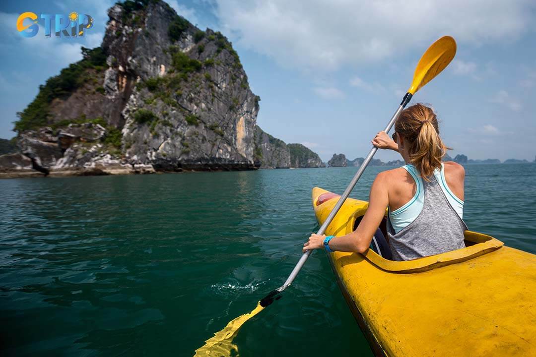 Tourists are kayaking at Minh Chau