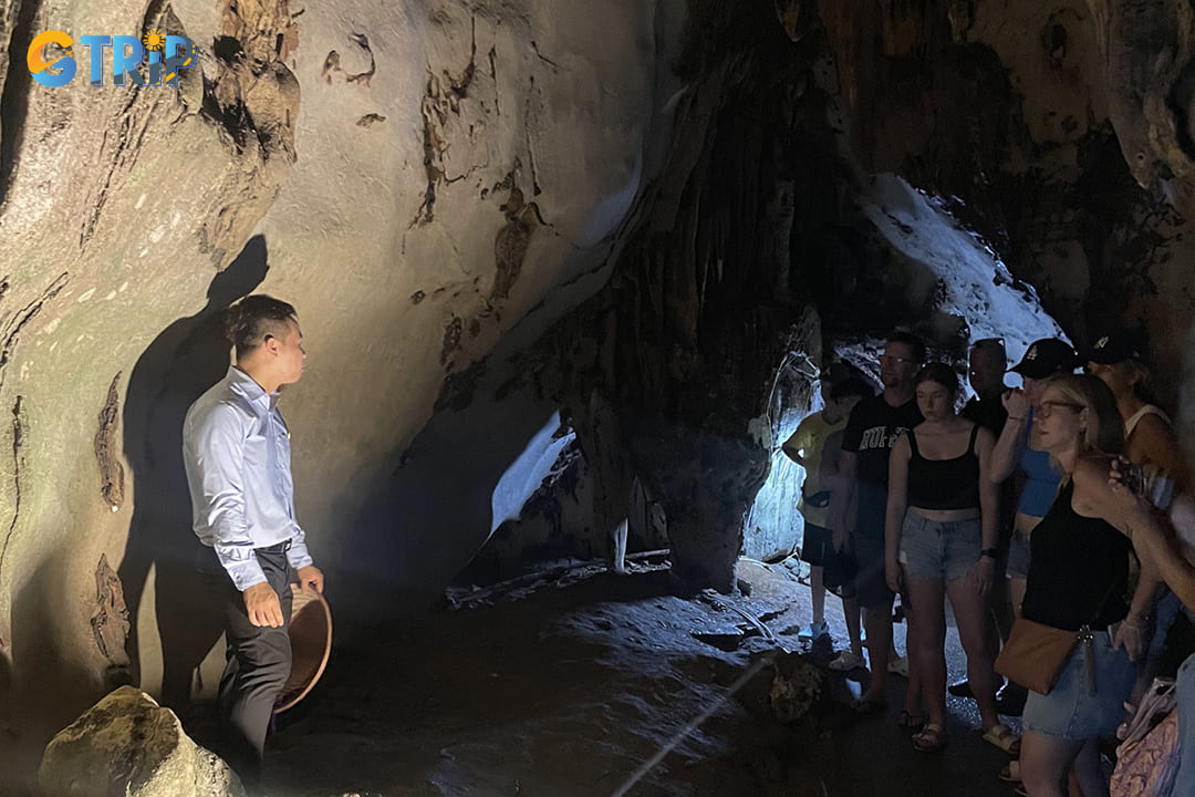 Tourists are listening to the stories about local legends