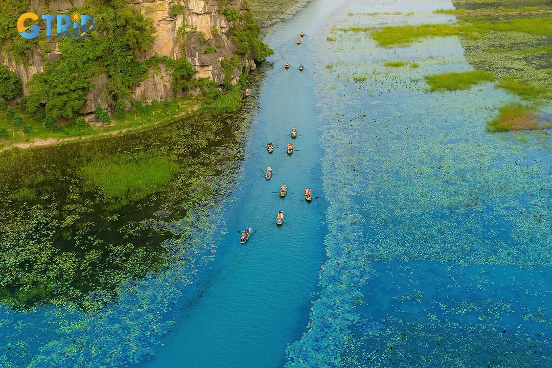 Tourists boating along the Ngo Dong River