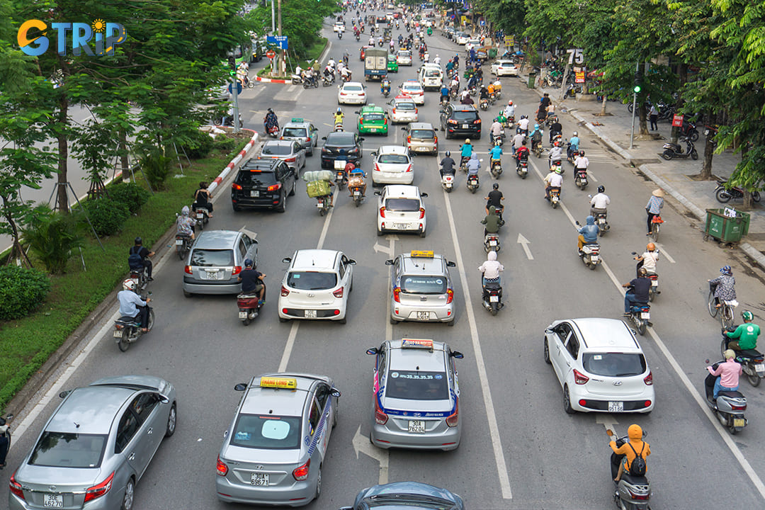 Traditional taxi services remain prevalent throughout Hanoi, offering direct transportation to Truc Bach Lake without the need for smartphone apps