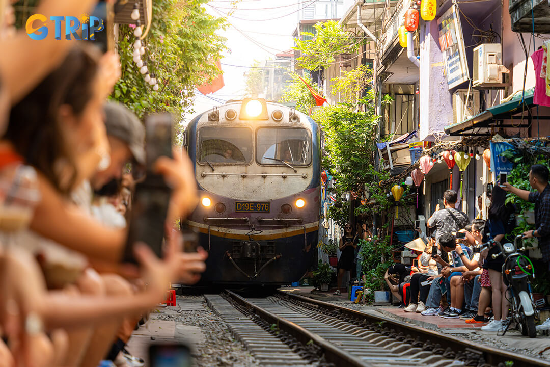 Train Street is a unique urban spot where trains pass inches from homes, offering a thrilling experience best enjoyed at alternative viewing points while respecting residents
