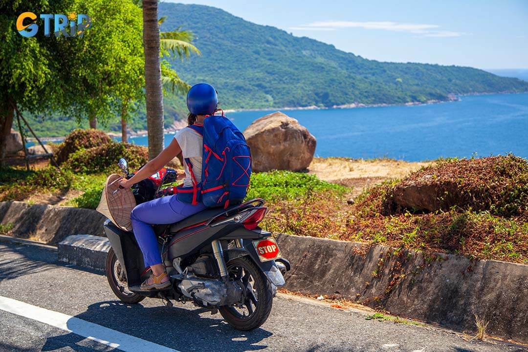 The girl traveling by motorbike