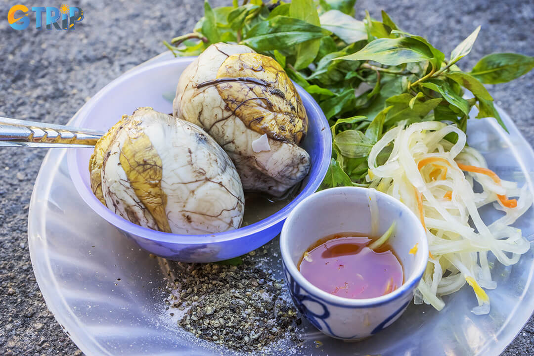 Trung vit lon is a bold Vietnamese street food delicacy, prized for its rich, savory flavor and enjoyed with herbs, salt, and lime