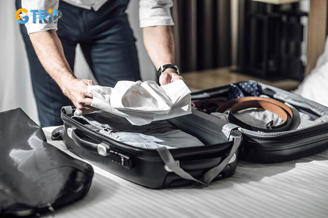 Use packing cubes and smart folding techniques to keep your business travel suitcase organized, space-efficient, and wrinkle-free