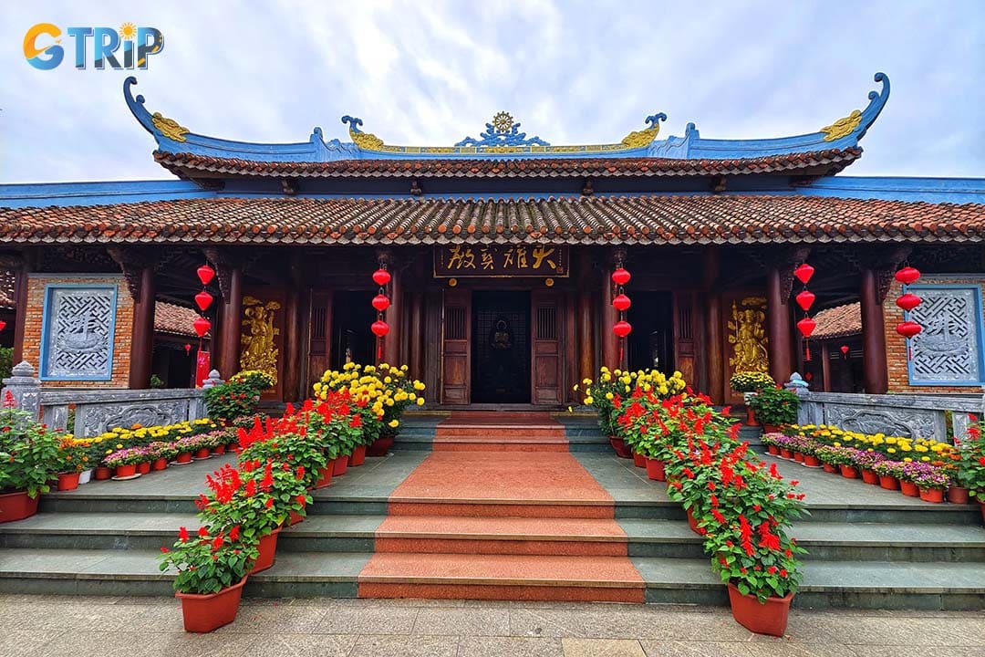 Van Duc Pagoda is a peaceful, authentic spiritual retreat surrounded by lush gardens and ancient trees, offering travelers a quiet space