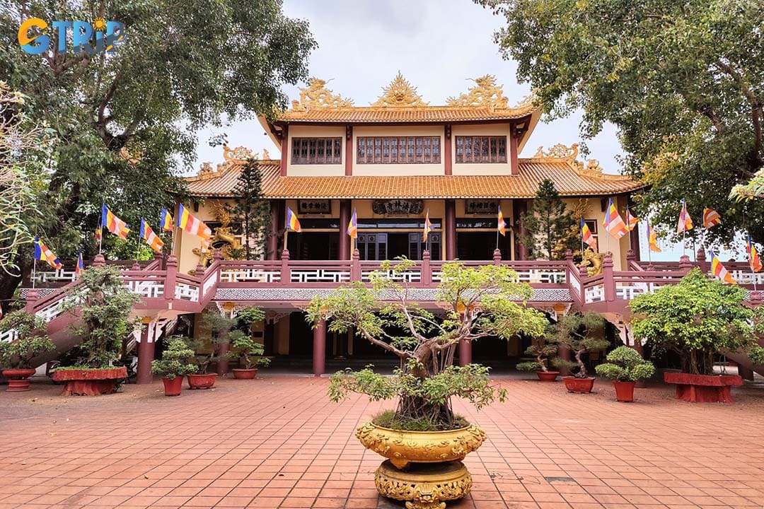 Visit Phap Lam Pagoda, a tranquil urban sanctuary known for its elegant gardens, impressive Buddha statues, and peaceful atmosphere amid the city bustle