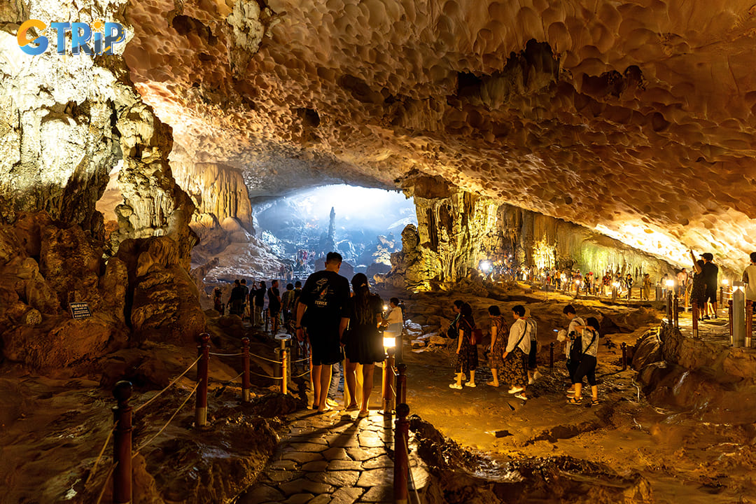 Tourists are amazed by the unique formations in the cave’s two chambers