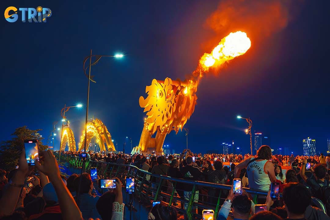 Watching the iconic Dragon Bridge Fire and Water Show is a must-do activity when visiting Da Nang at night