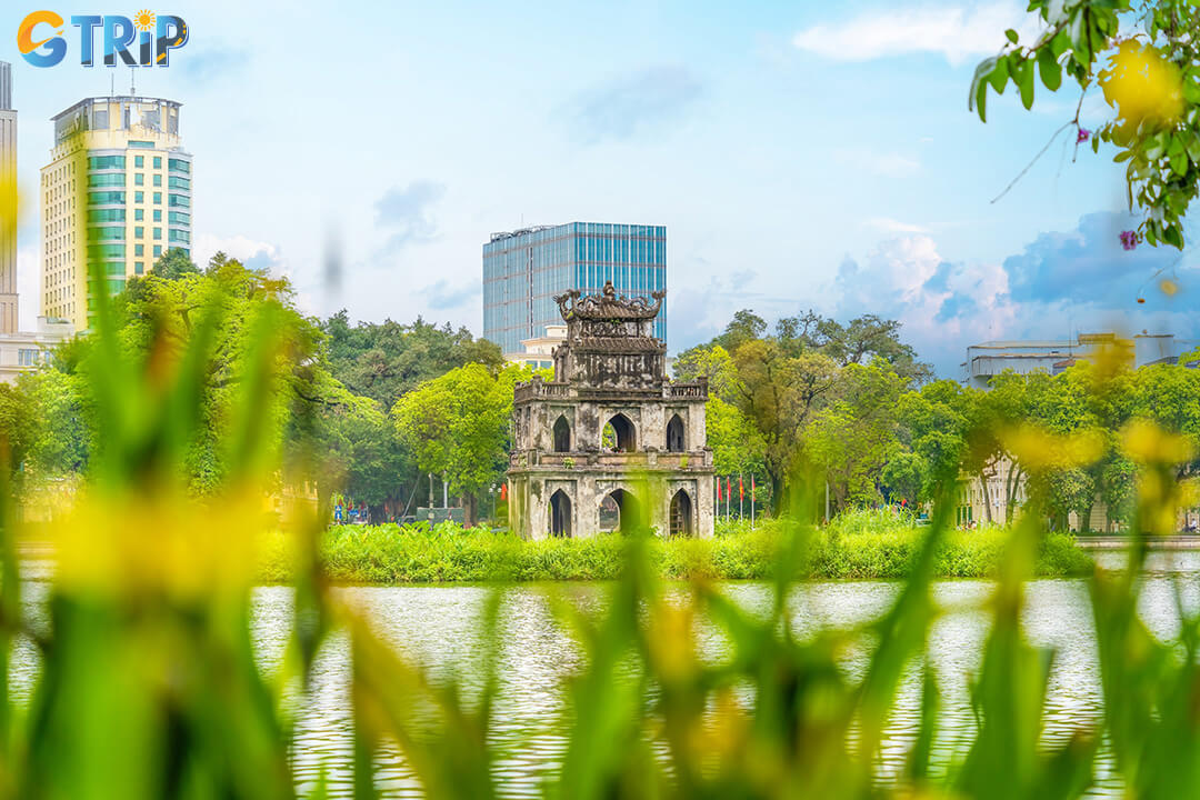 Wrap up your Hanoi journey with a twilight stroll by Hoan Kiem Lake, reflecting on four days of rich cultural discovery