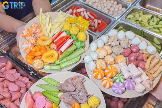 Xien ban is a fun and affordable Hanoi street snack of deep-fried skewered balls, crispy outside, chewy inside, and served with flavorful sauces