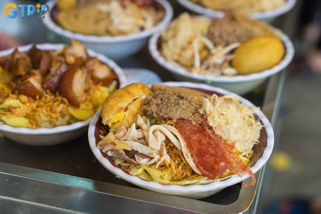 Xoi, Hanoi’s beloved sticky rice dish, is a hearty, portable breakfast with endless savory and sweet variations wrapped in tradition and flavor