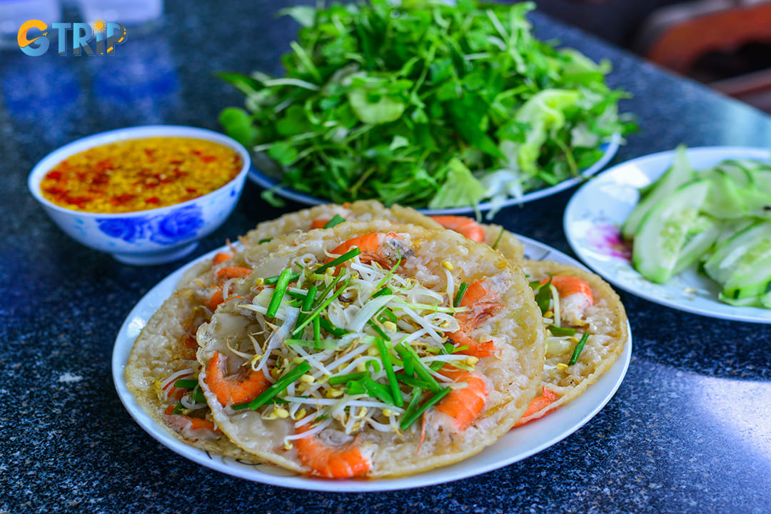 You can enjoy banh xeo (Vietnamese pancakes)