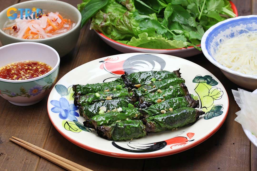 You can try bo la lot (grilled beef in wild betel leaves) near Mong Bridge