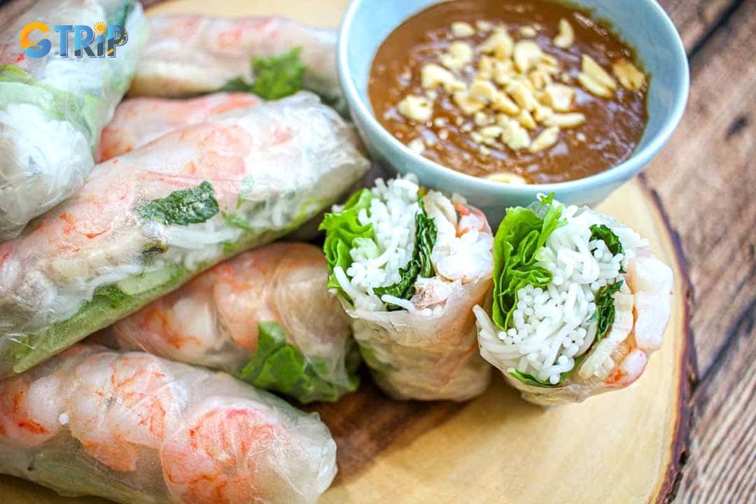 You can try goi cuon (fresh spring rolls) with peanut sauce in Ho Chi Minh City