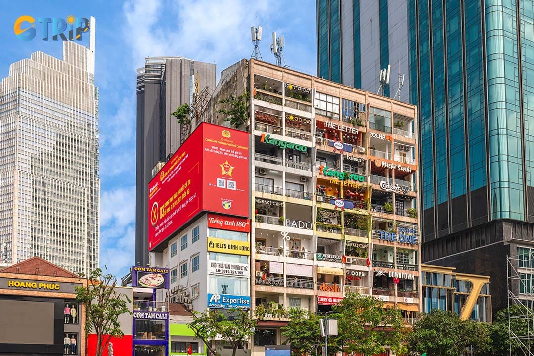 You can walk from the Calmette Bridge to visit the cafe apartment at 42 Nguyen Hue