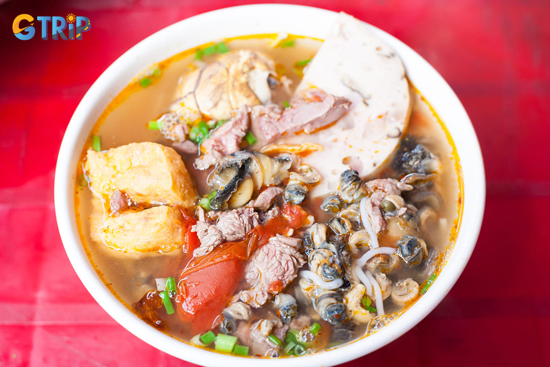 You should try bun oc (snail noodle soup) if you do not want to try a fried dish