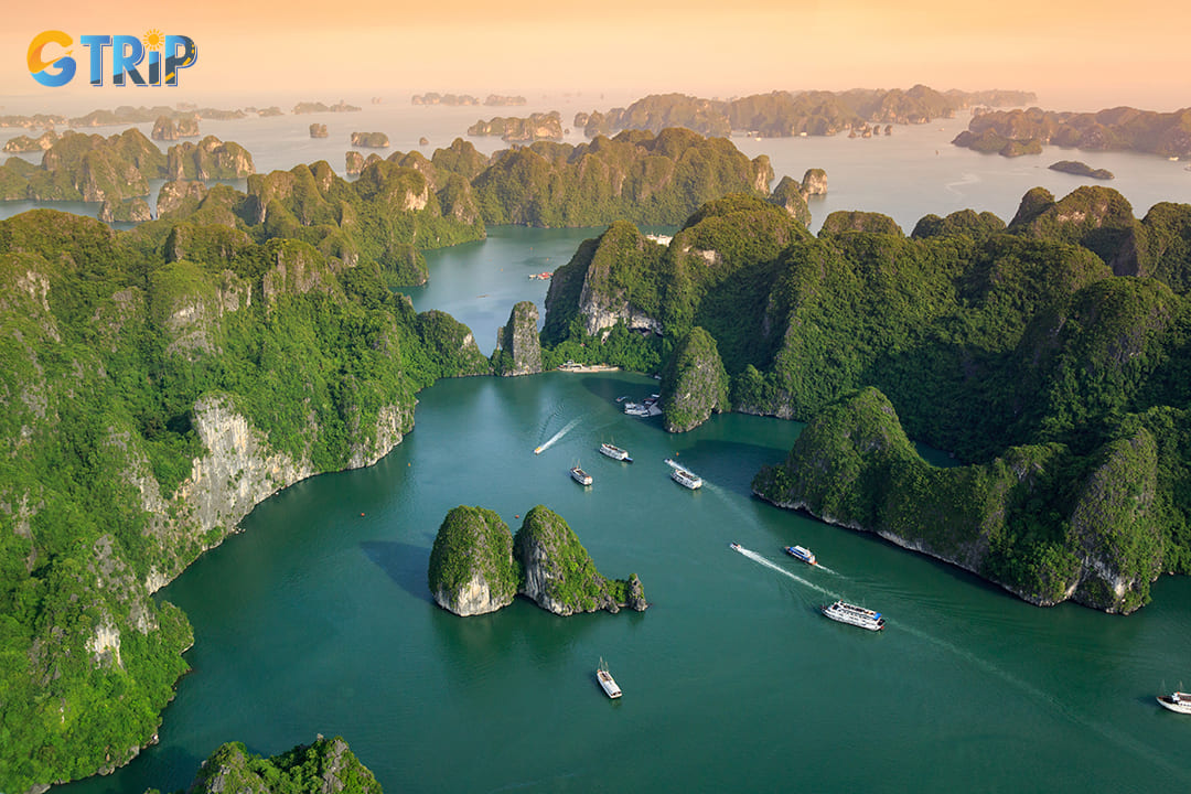 You should witness the mesmerizing Ha Long Bay sunset from the deck of a cruise